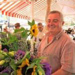 Flower seller at Cours Saleya open air flower market